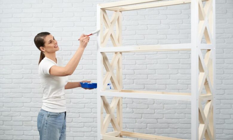 diy wooden contraption shelving with levers to open